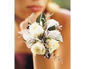 3 White Mini Roses Wristlet in McDonough GA, Absolutely Flowers