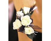 5 White Mini Roses Wristlet in McDonough GA, Absolutely Flowers